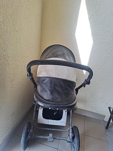 Коляски: Детская коляска-люлька с капюшоном, выполненная в черном цвете с — 3