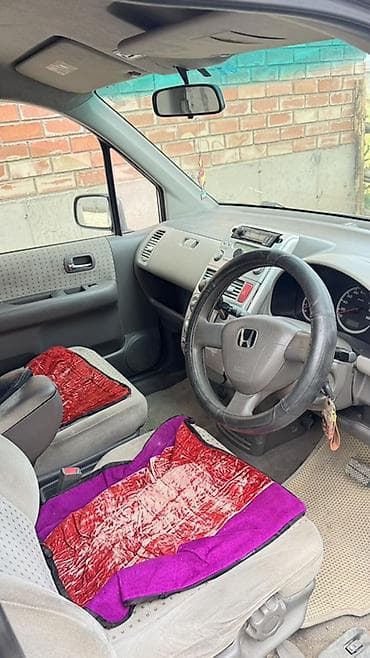 2005: Honda Mobilio: 2005 г., Минивэн — 7
