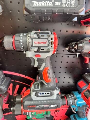 бу электроинструмент: Аккумуляторная дрель-шуруповерт от Crown с питанием 48 В. Имеет серый — 1