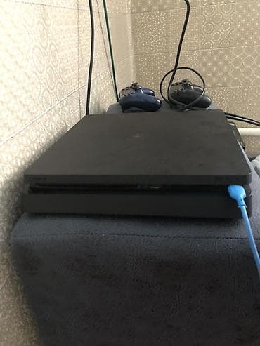 Техника жана электроника: Игровая приставка Sony PlayStation 4 Slim (чёрная) Комплектация: - — 1