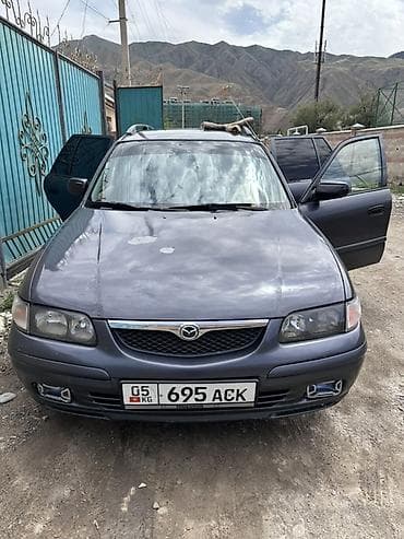 kukirin g2 pro max: Mazda Capella: 1999 г., 2 л, Механика, Бензин, Универсал — 4