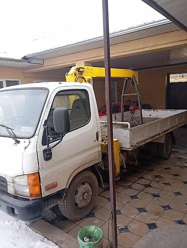 пошив детской одежды: Услуга: бортовой грузовик с краном-манипулятором Описание: - Бортовая — 2