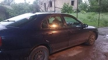 lancer 10: Mitsubishi Carisma: 1998 г., 1.8 л, Автомат, Седан — 2