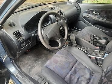 Mitsubishi Carisma: 1998 г., 1.6 л, Механика, Бензин, Седан — 5