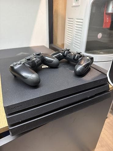 magic 7 pro: Игровая консоль Sony PlayStation 4 Pro (PS4 Pro) с двумя беспроводными — 1