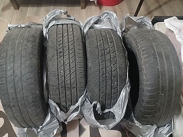 р14 17565: Комплект из 4 летних шин для легкового автомобиля. Размер: P215/65 — 4