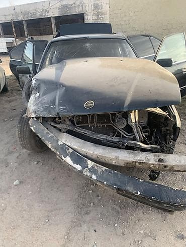 арзан матиз 1: BMW 5‑Series (E34), седан, черный цвет. Автомобиль после сильного — 1