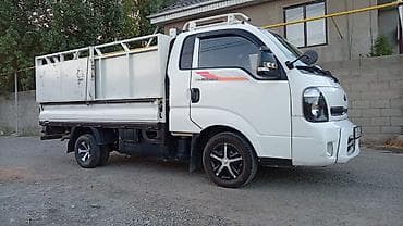 грузовик кия бонго: Kia Bongo III — компактный грузовик для города и пригородных — 2
