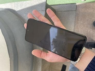 телефон 5: Смартфон черного цвета с современным дизайном. Оснащен двойной — 2