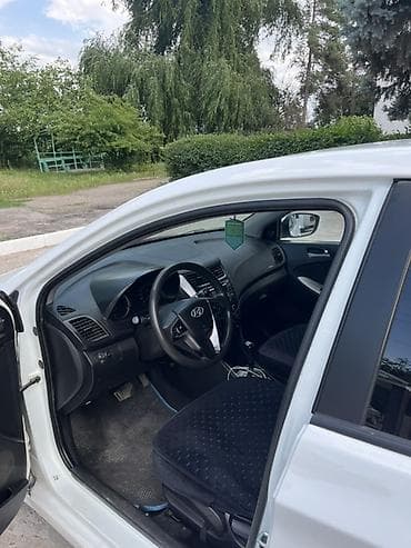 мультитул нож: Hyundai Solaris: 2015 г., 1.4 л, Автомат, Седан — 2
