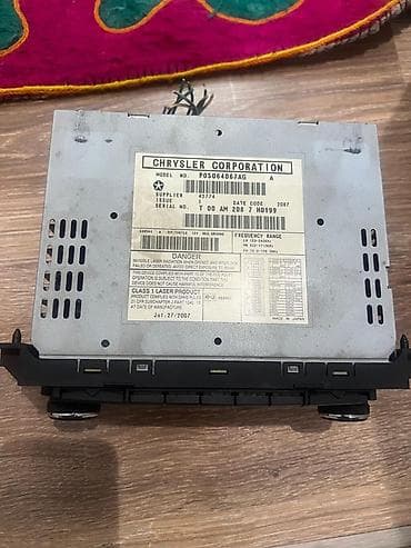 Техника и электроника: Штатная магнитола Chrysler Corporation - Модель: P05064067AG (Issue — 2