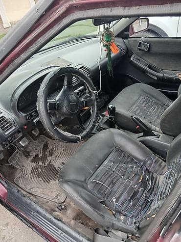 мазда 323 1990: Mazda 323: 1994 г., Механика, Бензин, Хэтчбэк — 4