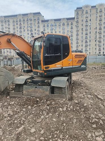 Экскаватор, Hyundai, 2012 г., Колесный