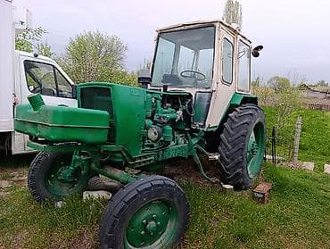 беларус тирактор: Тра Кабина: - Полностью закрытая, с дверями Особенности: - — 2