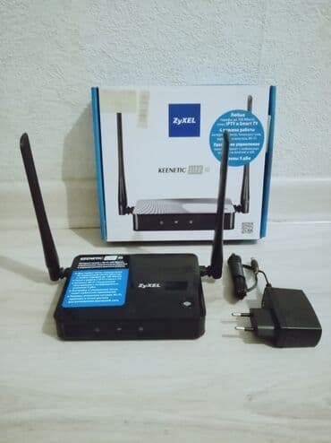 Модемы и сетевое оборудование: Wi-Fi роутер Zyxel Keenetic Lite III rev.B. Интернет центр для