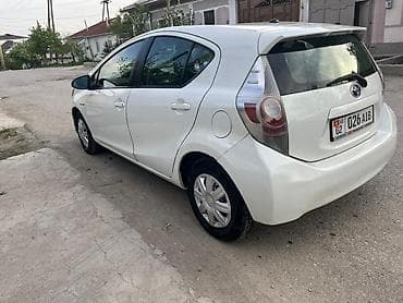 yamaha p125: Toyota Prius C: 2013 г., 1.5 л, Вариатор, Гибрид, Хэтчбэк — 7