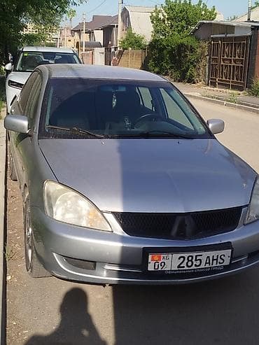 Mitsubishi Lancer: 2006 г., 1.6 л, Механика, Бензин, Седан