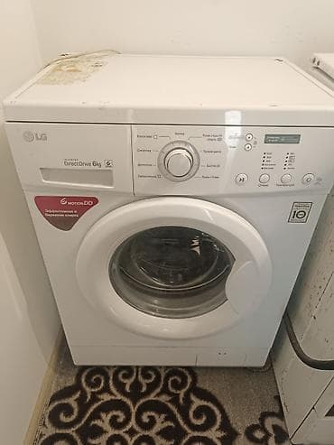 macbook 12: Стиральная машина LG с фронтальной загрузкой, инверторный Direct — 1