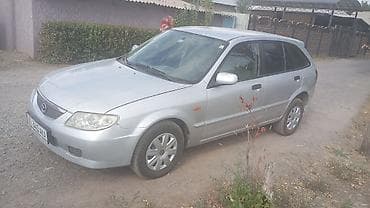 ключи машины: Mazda 323: 2002 г., 1.6 л, Механика, Бензин, Хэтчбэк — 2
