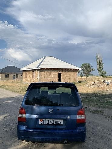 Унаа: Mazda Demio: 2002 г., 1.3 л, Кол менен иштөөчү, Бензин, Хетчбек — 5