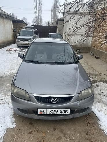 Mazda 323: 2003 г., 2 л, Ручные, Дизель, Хэтчбэк