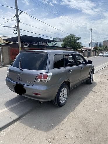lancer 10: Mitsubishi Airtrek: 2001 г., 2 л, Автомат, Бензин, Кроссовер — 3