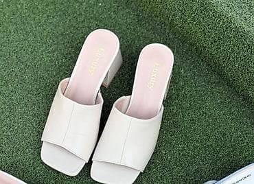 Почти как новая Минималистичные женские мюли на устойчивом каблуке. -