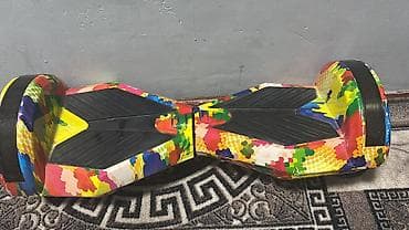 гераскутеры: Гироскутер с ярким многоцветным принтом. Особенности: - Диаметр — 2