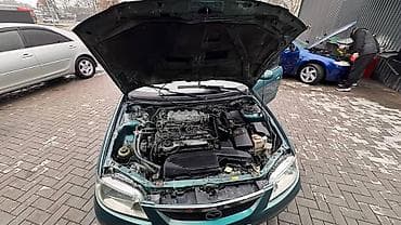 некая 3: Mazda Familia: 2003 г., 1.6 л, Автомат, Бензин, Универсал — 10