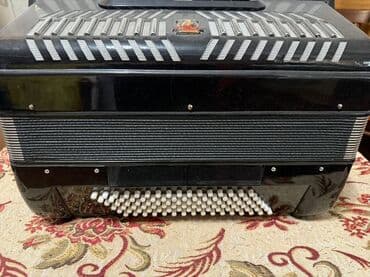 обучение фортепиано: Аккордеон Parrot (кнопочно-клавишный) Описание: - Корпус черного — 4