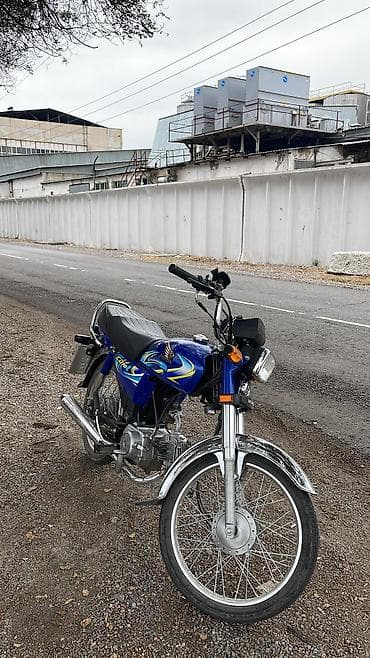 Мотоцикл Honda C70 (Cub) синего цвета - Легкий городской мопед-класс lalafo.kg да Мотоцикл Honda C70 (Cub) синего цвета - Легкий городской мопед-класс