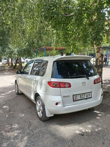 срочно продаю в связи с переездом: Mazda Demio: 2005 г., 1.4 л, Автомат, Бензин, Хетчбек — 4