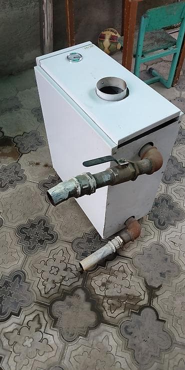 газовый кател бу: Котёл газовый напольный "Гефест", б/у с трубой в комплекте — 3