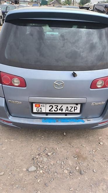Mazda Demio: 2004 г., 1.5 л, Автомат, Бензин, Хэтчбэк — 5