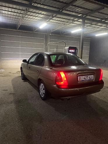 Транспорт: Daewoo Nubira: 1998 г., Седан — 2
