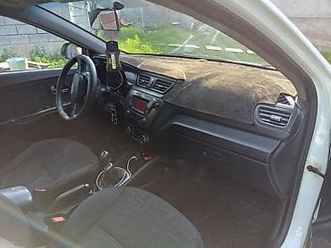 Продажа авто: Kia Rio: 2012 г., 1.6 л, Механика, Бензин, Седан — 6