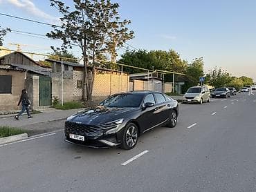 aion v: Kia K8: 2021 г., 1.6 л, Робот, Бензин, Фастбек — 1