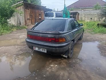 Mazda 323: 1989 г., Кол менен иштөөчү, Седан — 4