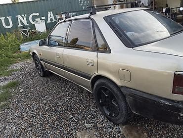 бюджетные авто: Mazda 626: 1991 г., 2 л, Механика, Седан — 4