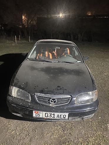 Mazda 626: 1999 г., 2.5 л, Механика, Бензин, Седан