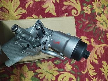 Автохимия: Масляный радиатор Opel Новый — 1