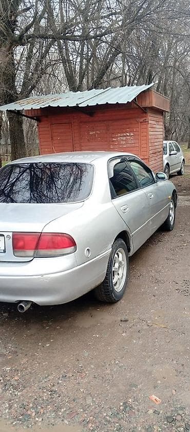 задний стоп мазда 323: Mazda Cronos: 1993 г., 1.8 л, Механика, Бензин, Седан — 3