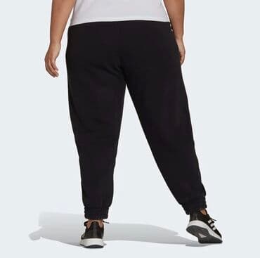 Брюки: ADIDAS. Теплые спортивные штаны Essentials с золотым логотипом.Мягкий — 2