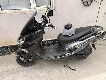 aion v plus: Скутер Wuben (50–125 cc класс) в чёрном цвете. Реальным клиентам — 2