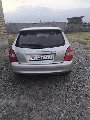 Mazda 323: 2003 г., 1.6 л, Механика, Бензин, Хэтчбэк
