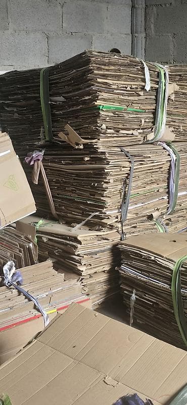 приём кардон: Гофрокартон, сложенный и увязанный в кипы Описание: - Большие партии — 2