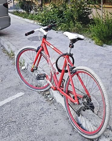 Городской велосипед с rigid-рамой и рулём MTB-формы Характеристики: -