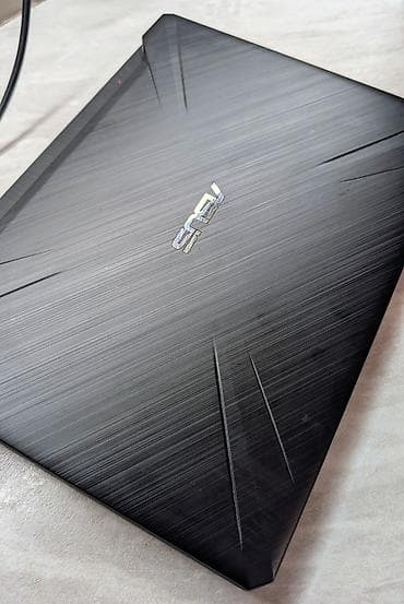 Игровой ноутбук ASUS TUF Gaming FX505DT Характеристики: - Процессор