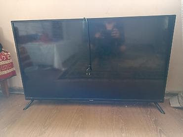 ТВ и видео: Телевизор Hisense, диагональ около 43–50". Особенности: - Тонкая — 1