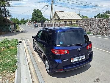 б в: Mazda Demio: 2004 г., 1.3 л, Автомат, Бензин, Хэтчбэк — 3